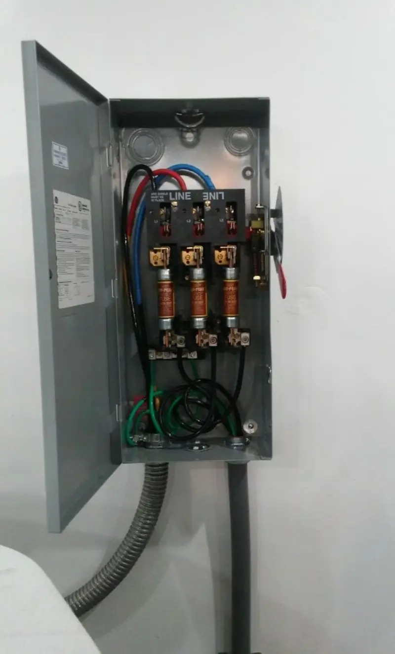 Three-phase disconnect switch installed for Smoke Detector Installation in Bedford